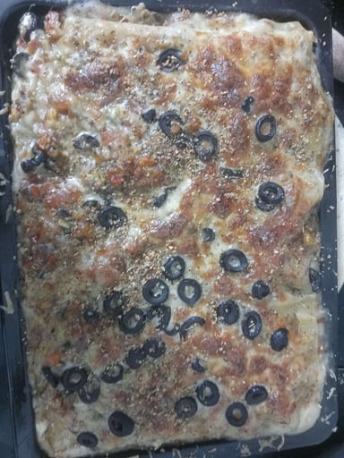 Tasty Veg Lasagna cooked by COOX chefs cooks during occasions parties events at home