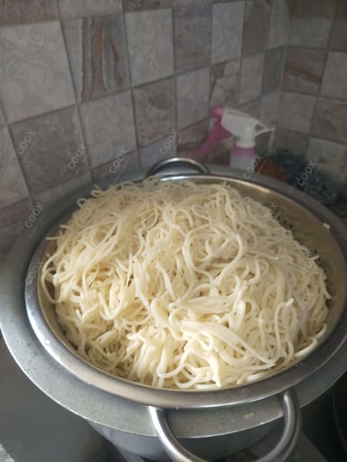 Tasty Chicken Hakka Noodles cooked by COOX chefs cooks during occasions parties events at home
