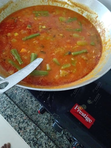 Tasty Vada Sambhar cooked by COOX chefs cooks during occasions parties events at home
