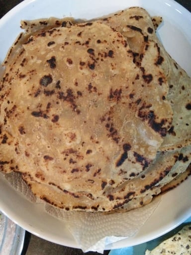 Tasty Missi Roti cooked by COOX chefs cooks during occasions parties events at home