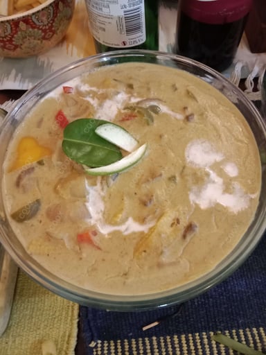 Tasty Green Thai Curry cooked by COOX chefs cooks during occasions parties events at home