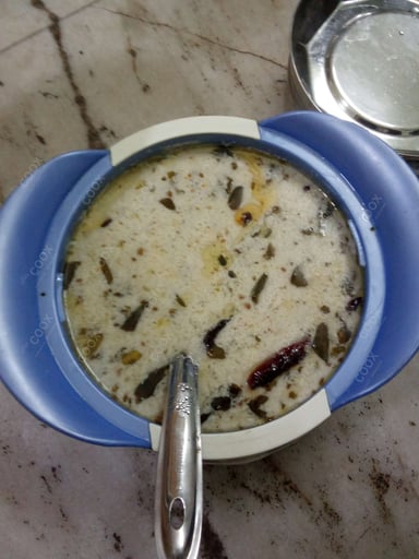 Tasty Vrat ki Kadhi cooked by COOX chefs cooks during occasions parties events at home