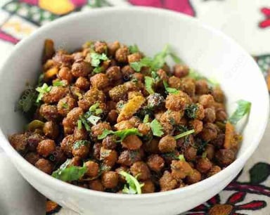 Tasty Kala Chana (Dry) cooked by COOX chefs cooks during occasions parties events at home