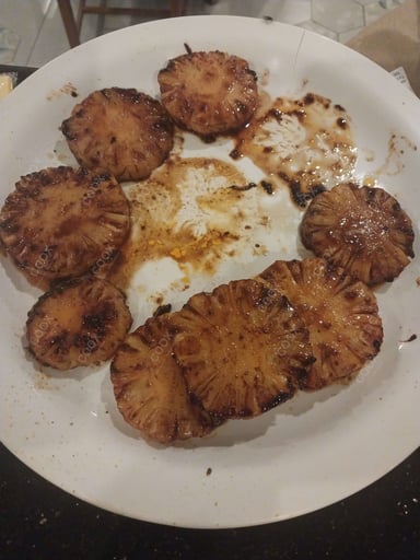Tasty Pan Fried Pineapple cooked by COOX chefs cooks during occasions parties events at home