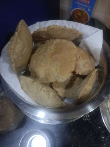 Tasty Kuttu ki Pooris cooked by COOX chefs cooks during occasions parties events at home