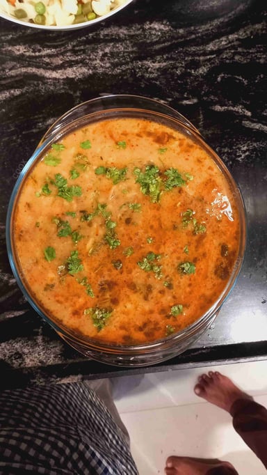 Tasty Aloo Rasedar cooked by COOX chefs cooks during occasions parties events at home
