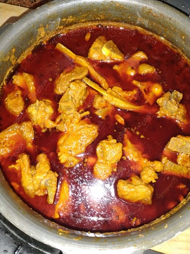 Tasty Mutton Korma cooked by COOX chefs cooks during occasions parties events at home