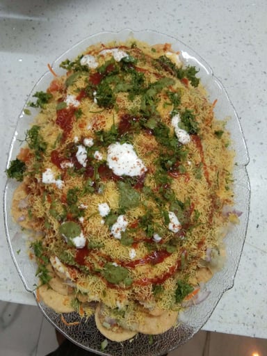Tasty Papdi Chaat cooked by COOX chefs cooks during occasions parties events at home