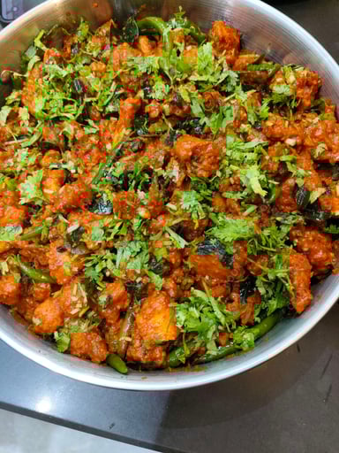 Tasty Chilli Chicken cooked by COOX chefs cooks during occasions parties events at home