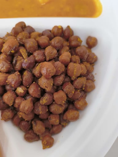 Tasty Kala Chana (Dry) cooked by COOX chefs cooks during occasions parties events at home