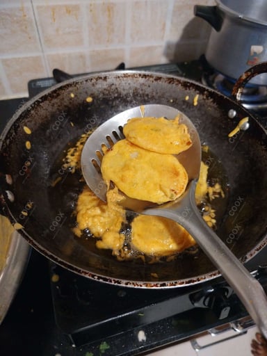 Tasty Aloo Bonda cooked by COOX chefs cooks during occasions parties events at home
