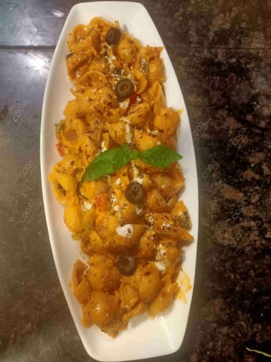 Tasty Pasta in Red Sauce cooked by COOX chefs cooks during occasions parties events at home