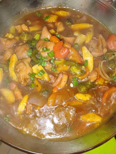 Tasty Mix Veg in Schezwan Sauce cooked by COOX chefs cooks during occasions parties events at home
