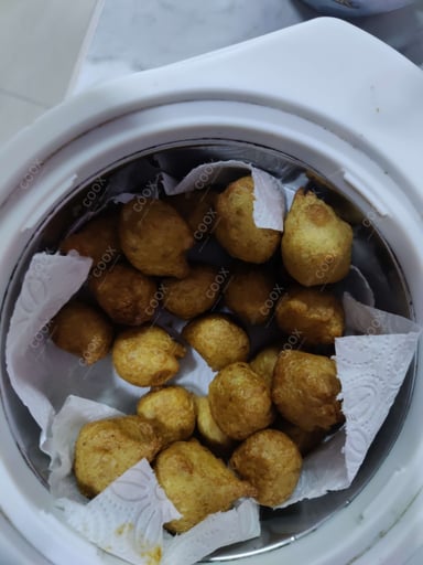 Tasty Moong Dal Mangode cooked by COOX chefs cooks during occasions parties events at home