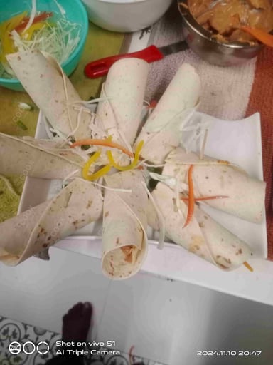 Tasty Chicken Kathi Rolls cooked by COOX chefs cooks during occasions parties events at home