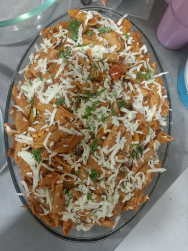 Tasty Pasta in Red Sauce cooked by COOX chefs cooks during occasions parties events at home