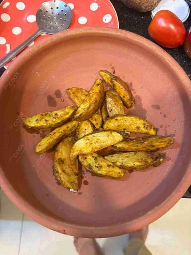 Tasty Potato Wedges cooked by COOX chefs cooks during occasions parties events at home