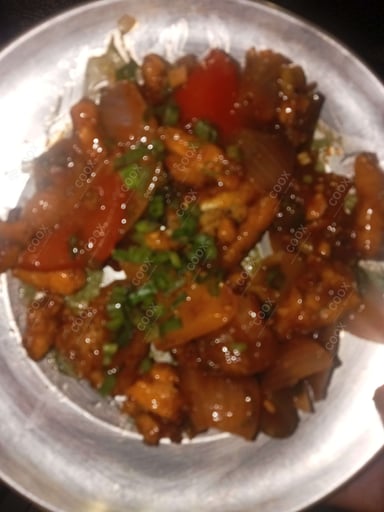 Tasty Crispy Chilli Baby Corn cooked by COOX chefs cooks during occasions parties events at home