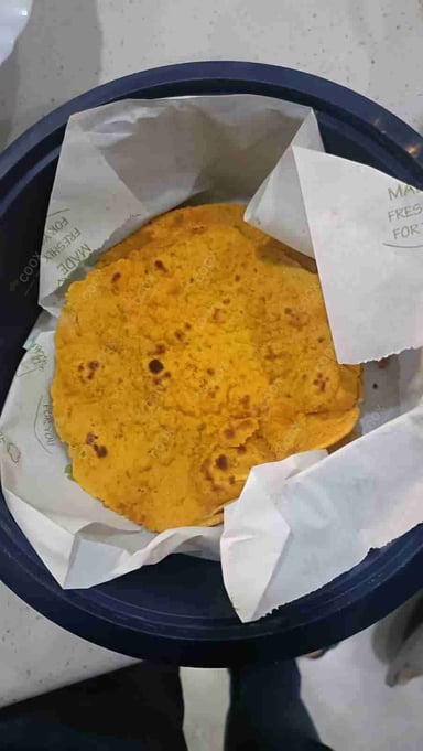 Tasty Missi Roti cooked by COOX chefs cooks during occasions parties events at home