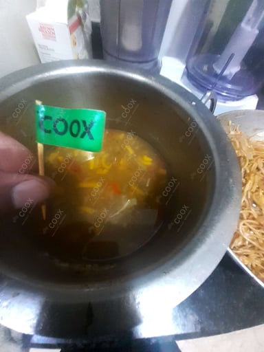 Tasty Vegetable Manchow Soup cooked by COOX chefs cooks during occasions parties events at home