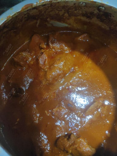 Tasty Chicken Korma cooked by COOX chefs cooks during occasions parties events at home