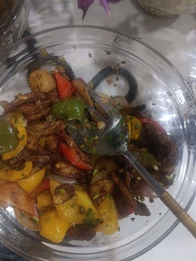 Tasty Crispy Chilli Baby Corn cooked by COOX chefs cooks during occasions parties events at home