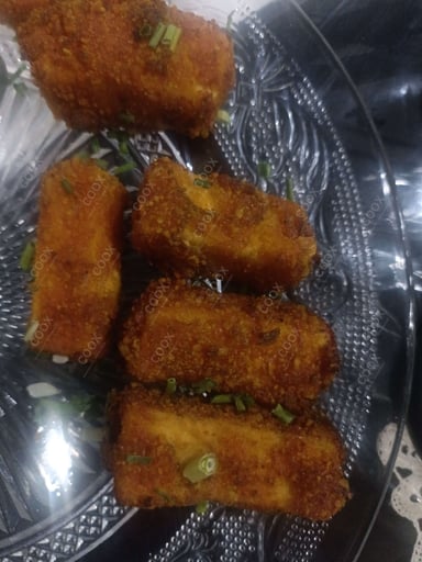 Tasty Threaded Paneer  cooked by COOX chefs cooks during occasions parties events at home