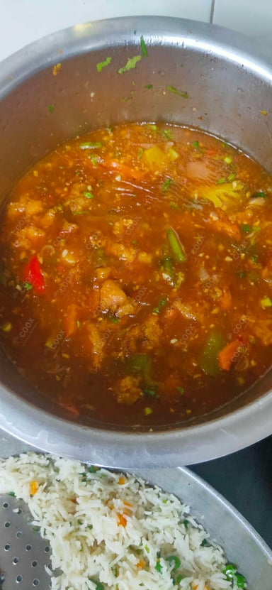 Tasty Chicken In Burnt Garlic Sauce cooked by COOX chefs cooks during occasions parties events at home