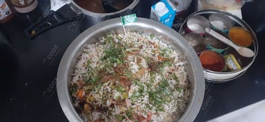Tasty Veg Biryani cooked by COOX chefs cooks during occasions parties events at home