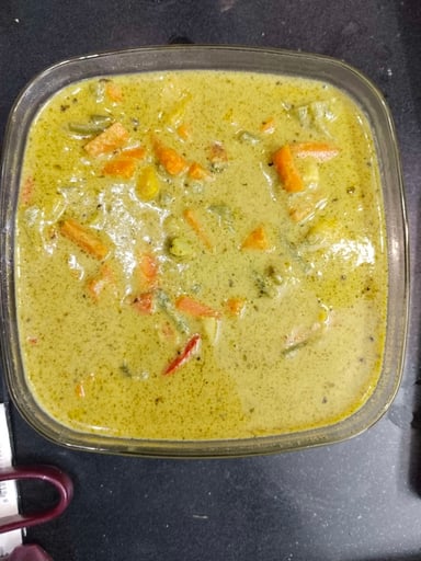 Tasty Green Thai Curry cooked by COOX chefs cooks during occasions parties events at home