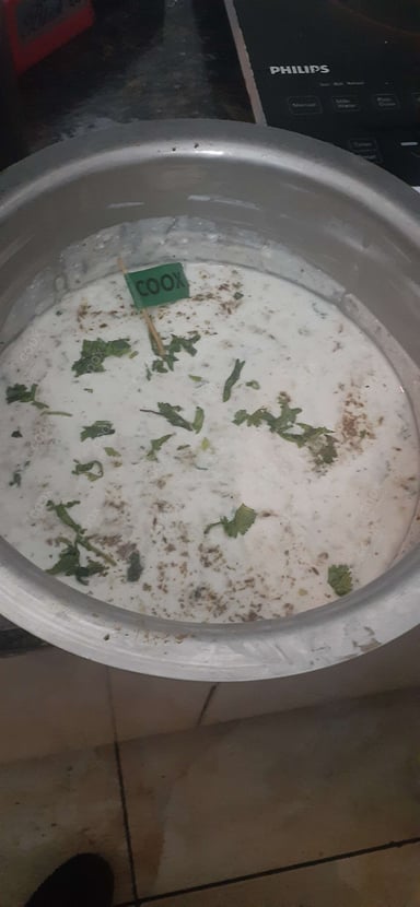 Tasty Plain Raita cooked by COOX chefs cooks during occasions parties events at home