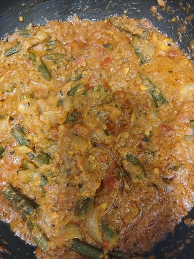 Tasty Bhindi do Pyaza cooked by COOX chefs cooks during occasions parties events at home