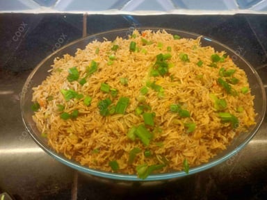 Tasty Burnt Garlic Rice cooked by COOX chefs cooks during occasions parties events at home