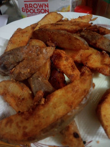 Tasty Potato Wedges cooked by COOX chefs cooks during occasions parties events at home