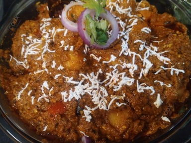 Tasty Vegetable Manchow Soup cooked by COOX chefs cooks during occasions parties events at home