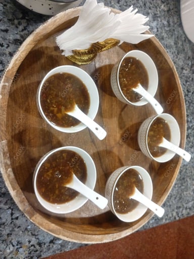 Tasty Hot & Sour Soup cooked by COOX chefs cooks during occasions parties events at home