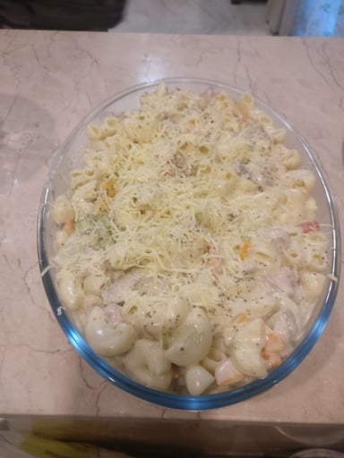 Tasty Chicken Pasta in White Sauce cooked by COOX chefs cooks during occasions parties events at home