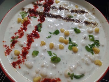 Tasty Plain Raita cooked by COOX chefs cooks during occasions parties events at home