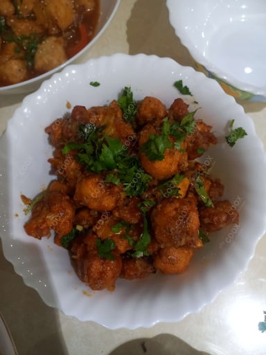 Tasty Gobhi 65 cooked by COOX chefs cooks during occasions parties events at home