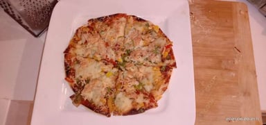 Tasty Veg Pizza cooked by COOX chefs cooks during occasions parties events at home