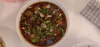 Tasty Veg Manchurian (Gravy) cooked by COOX chefs cooks during occasions parties events at home