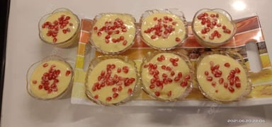 Tasty Fruit Custard cooked by COOX chefs cooks during occasions parties events at home