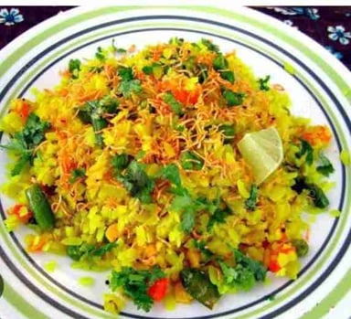 Tasty Poha cooked by COOX chefs cooks during occasions parties events at home