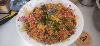 Tasty Bhel Puri cooked by COOX chefs cooks during occasions parties events at home