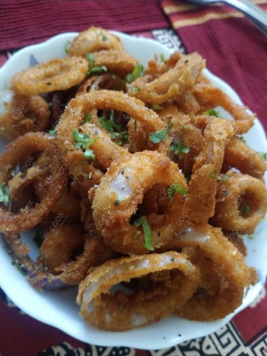Tasty Onion Rings cooked by COOX chefs cooks during occasions parties events at home