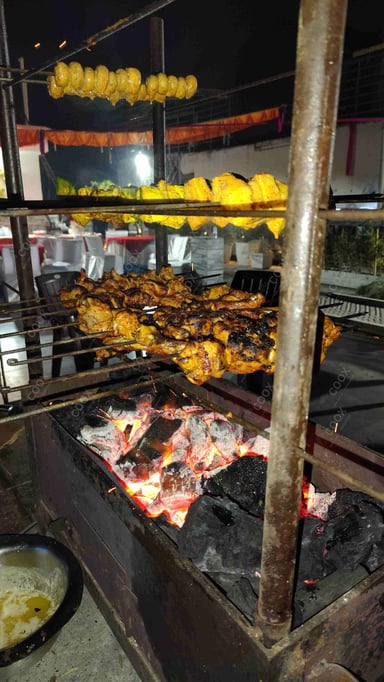 Tasty Tandoori Chicken cooked by COOX chefs cooks during occasions parties events at home