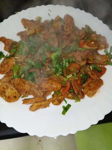 Tasty Chilli Lotus Stem cooked by COOX chefs cooks during occasions parties events at home