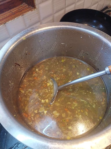 Tasty Lemon Coriander Soup cooked by COOX chefs cooks during occasions parties events at home