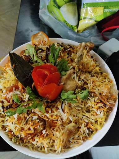 Tasty Chicken Biryani cooked by COOX chefs cooks during occasions parties events at home