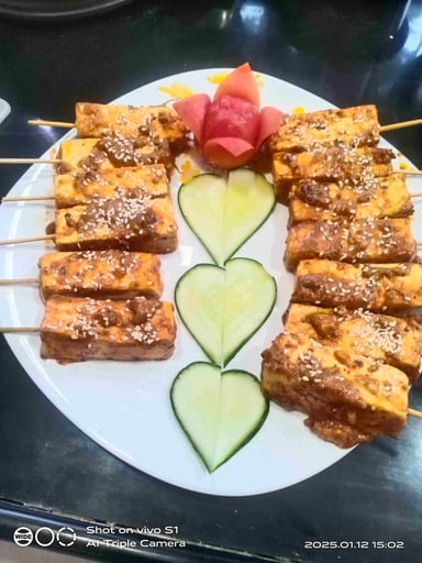 Tasty Thai Paneer Satay cooked by COOX chefs cooks during occasions parties events at home
